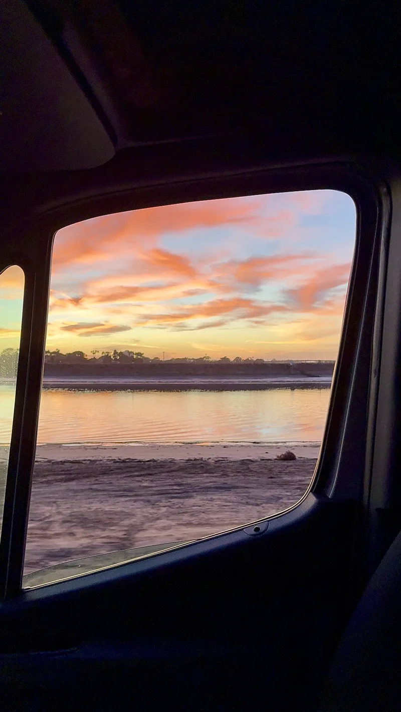 Sunset framed by a van window